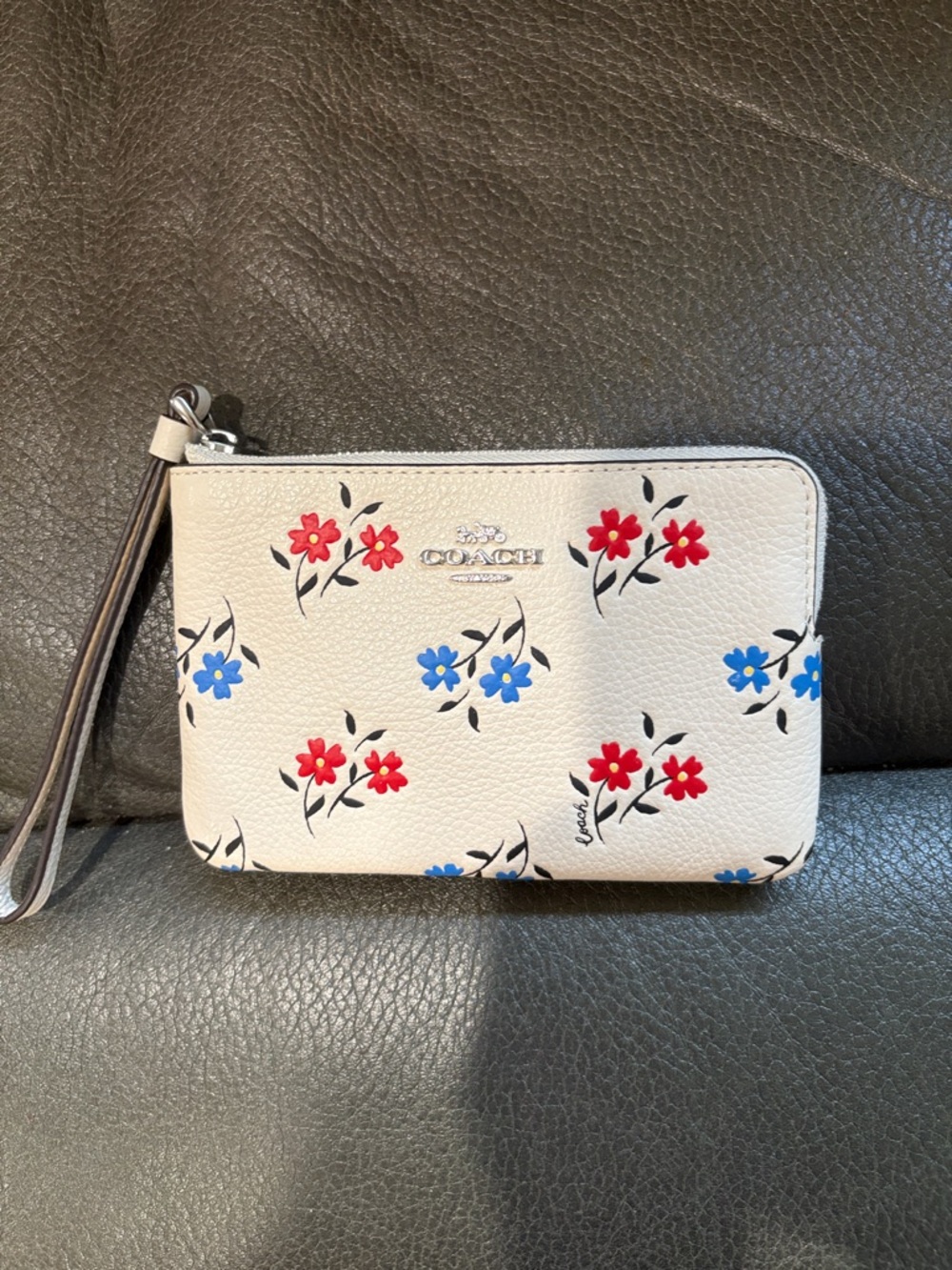Coach white chalk multi floral wristlet